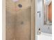 Shower stall with tiled walls and a modern shower head at 6618 3Rd N Ave, St Petersburg, FL 33710