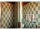 Bathroom featuring tiled shower, vintage toilet, and towel rack at 724 69Th S Ave, St Petersburg, FL 33705