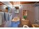 Retro bathroom featuring tiled walls and a vintage sink and toilet at 724 69Th S Ave, St Petersburg, FL 33705