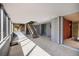 Unique mid-century modern hallway with natural lighting and an open staircase at 724 69Th S Ave, St Petersburg, FL 33705