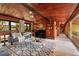 Comfortable living room features hardwood accents, decorative shelves, and a piano at 724 69Th S Ave, St Petersburg, FL 33705