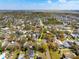 Birds-eye view of the property with surroundings, emphasizing community and the house location is marked by a yellow arrow at 7415 S Obrien St, Tampa, FL 33616