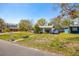 Cozy single-story home featuring a neatly kept lawn and a peaceful neighborhood setting at 7415 S Obrien St, Tampa, FL 33616
