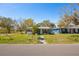 Charming single-story home with a well-maintained front yard and street view at 7415 S Obrien St, Tampa, FL 33616
