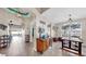 Open-concept dining area featuring tile flooring and contemporary lighting fixture at 8220 Round Leaf Ln, Riverview, FL 33578