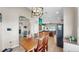 Casual dining area with connecting kitchen and access to the home's living spaces at 8220 Round Leaf Ln, Riverview, FL 33578