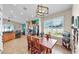 Kitchen and dining area combo offers a seamless cooking and dining experience at 8220 Round Leaf Ln, Riverview, FL 33578