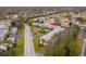 Apartment complex with parking and mature tree coverage as seen from above at 8303 Bardmoor Blvd # 105, Seminole, FL 33777