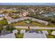 Aerial view of a quiet apartment community with a pool and parking at 8303 Bardmoor Blvd # 105, Seminole, FL 33777