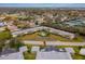 An aerial view of a quiet apartment complex with a community pool at 8303 Bardmoor Blvd # 105, Seminole, FL 33777