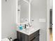 Well lit bathroom features lots of counter space and large mirror at 8303 Bardmoor Blvd # 105, Seminole, FL 33777