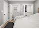 Spacious bedroom featuring closet space and a comfortable bed at 8303 Bardmoor Blvd # 105, Seminole, FL 33777