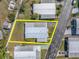 This aerial view highlights the property lines on a well-maintained mobile home and mature landscaping at 9790 66Th N St # 469, Pinellas Park, FL 33782