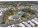 Beautiful aerial view of the community featuring pools, common areas, and neatly arranged homes at 9790 66Th N St # 469, Pinellas Park, FL 33782