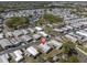 This aerial view highlights the property's location within a well-maintained mobile home park with mature landscaping at 9790 66Th N St # 469, Pinellas Park, FL 33782