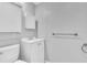 Neutral bathroom featuring a modern vanity, toilet, and storage for a clean, minimalist aesthetic at 9790 66Th N St # 469, Pinellas Park, FL 33782
