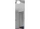 Bright hallway with a closet and neutral decor for a clean and functional living space at 9790 66Th N St # 469, Pinellas Park, FL 33782