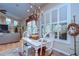 Bright dining area with plantation shutters at 10130 Paddock Oaks Dr, Riverview, FL 33569