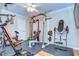 Home gym equipped with weightlifting equipment and rubber flooring at 10130 Paddock Oaks Dr, Riverview, FL 33569