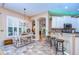 Kitchen and dining area with tile floors and natural light at 10130 Paddock Oaks Dr, Riverview, FL 33569