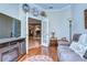 Inviting living room with a fireplace, comfortable seating, and an open doorway to the dining area at 10130 Paddock Oaks Dr, Riverview, FL 33569