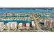 Breathtaking aerial view of the complex, capturing its waterfront location and panoramic views of the Intracoastal Waterway at 113 Island Way # 241, Clearwater Beach, FL 33767