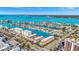 Breathtaking aerial view of waterfront condos nestled amongst canals and beautiful bay at 113 Island Way # 241, Clearwater Beach, FL 33767