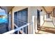 Exterior hallway with painted walls, lighting, and view of water at 113 Island Way # 241, Clearwater Beach, FL 33767