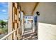 Exterior hallway with painted walls, lighting, with a view of beach and city landscape at 113 Island Way # 241, Clearwater Beach, FL 33767