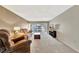 Inviting living room features neutral tones and access to the balcony at 113 Island Way # 241, Clearwater Beach, FL 33767