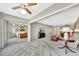 Open-concept living room with Primary bedroom view and access to dining area at 113 Island Way # 241, Clearwater Beach, FL 33767