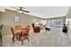 Spacious living room with comfortable seating and access to the balcony at 113 Island Way # 241, Clearwater Beach, FL 33767
