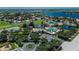 Overhead shot of community amenities featuring pools, a lake, a playground, and common areas at 11539 Captiva Kay Dr, Riverview, FL 33569