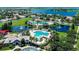 Scenic aerial view of community pools, lakes, and clubhouse at 11539 Captiva Kay Dr, Riverview, FL 33569