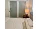 The bedroom is bathed in light, enhanced by light filtering blinds at 125 5Th Ne Ave # 240, St Petersburg, FL 33701