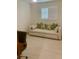 Inviting bedroom featuring neutral decor and comfortable seating area for relaxation at 125 5Th Ne Ave # 240, St Petersburg, FL 33701