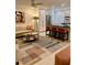 Chic living room with stylish furnishings and a sleek kitchen bar, creating a sophisticated space at 125 5Th Ne Ave # 240, St Petersburg, FL 33701