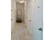 Hallway with storage lockers and a rolling cart at 125 5Th Ne Ave # 240, St Petersburg, FL 33701