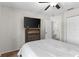 Bedroom with neutral walls, ceiling fan, a dresser, and a closet at 13411 Beechberry Dr, Riverview, FL 33579