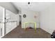 Spacious bonus room with a soccer net and basketball hoop is perfect for  at 13411 Beechberry Dr, Riverview, FL 33579