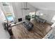 Bright, open floor plan offers views of the pool and backyard from the living room at 13411 Beechberry Dr, Riverview, FL 33579