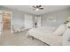 Bright main bedroom with hardwood floors and a walk-in closet at 1466 Laconia W Dr, Clearwater, FL 33764