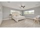 Spacious main bedroom with hardwood floors and plenty of natural light at 1466 Laconia W Dr, Clearwater, FL 33764