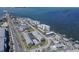 Breathtaking aerial shot of coastal properties, waterfront community, and scenic bay with a bridge at 340 Causeway Blvd # 108, Dunedin, FL 34698
