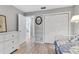 Cozy secondary bedroom leads to closets and other rooms with lots of sunlight at 340 Causeway Blvd # 108, Dunedin, FL 34698