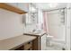 Bathroom featuring a step-in shower with built in seat at 3921 Chris Dr, Wesley Chapel, FL 33543