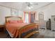 Bedroom featuring a comfortable queen size bed and ceiling fan at 3921 Chris Dr, Wesley Chapel, FL 33543