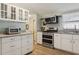 Well-equipped kitchen with modern appliances and ample cabinet space at 3921 Chris Dr, Wesley Chapel, FL 33543