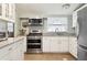 Well-equipped kitchen featuring stainless steel appliances and granite countertops at 3921 Chris Dr, Wesley Chapel, FL 33543