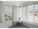 Bright sun room featuring lots of natural light from the windows at 3921 Chris Dr, Wesley Chapel, FL 33543